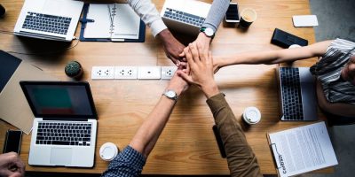 team-business-people-stacking-hands_53876-20873